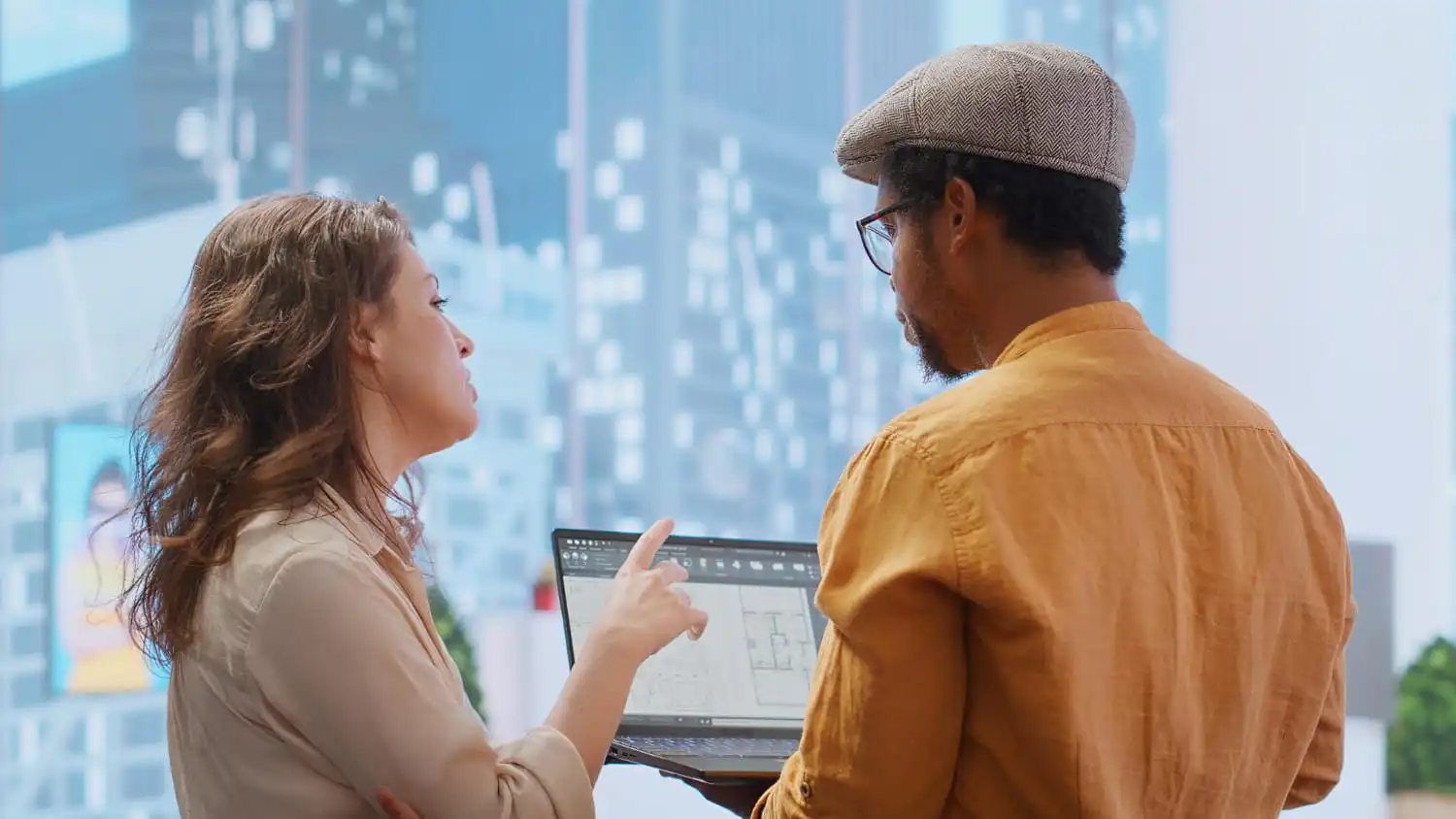 Construction project manager using AI-powered software to monitor project progress, team collaboration, schedules, and real-time site performance.
